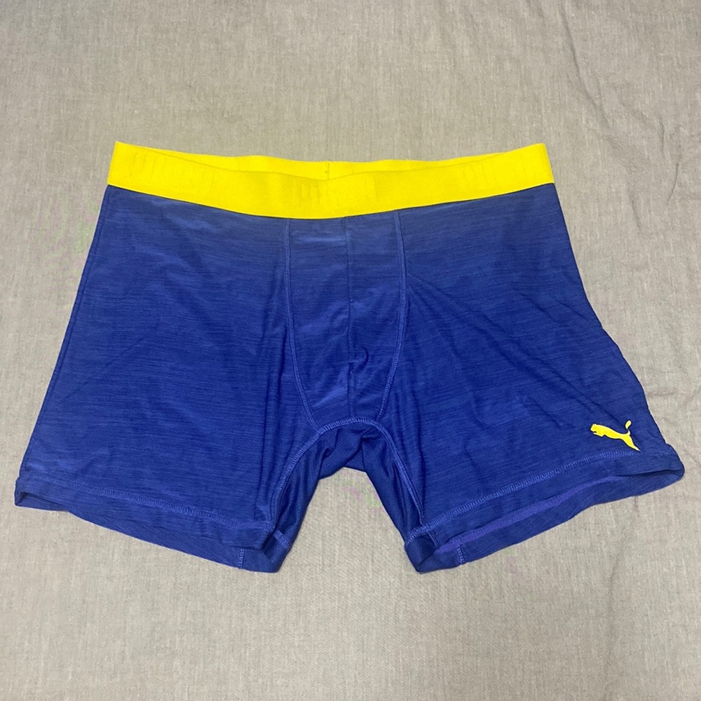 Puma compression shorts blue with yellow waist band. XL